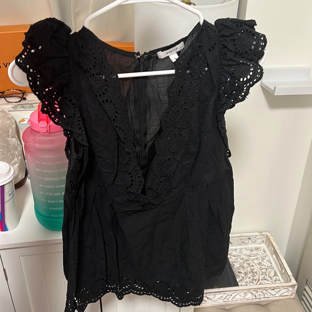 Black floral v neck top. Size Small. MAETTE.